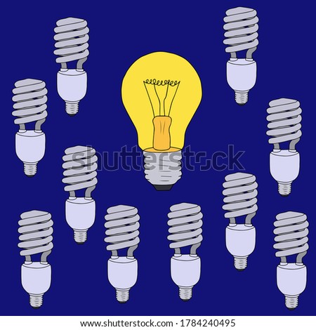 glowing incandescent lamp on the background of energy-saving lamps