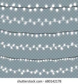 Glowing isolated Christmas lights vector set. Realistic Xmas light bulbs chains decor collection with transparent white shining.