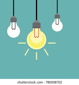 Glowing light bulb among dead ones.Concept of different-vector