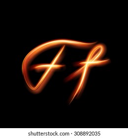 Glowing light letter F. Hand lighting painting