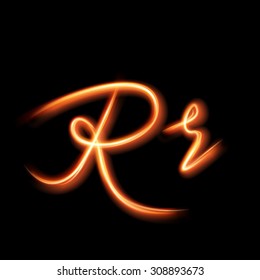 Glowing light letter R. Hand lighting painting