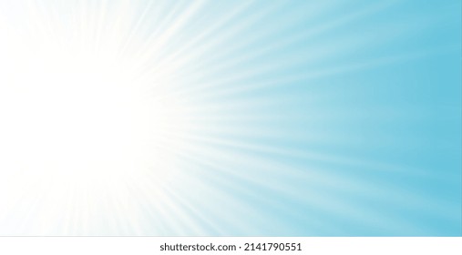 rayos de luz brillantes sobre fondo azul cielo