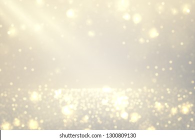 Glowing lights effect. Defocused golden glitter dust. Abstract sparkling magical background