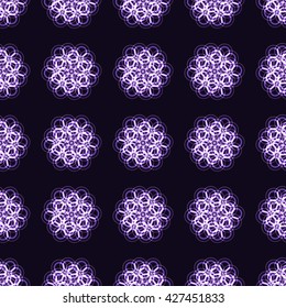 glowing magic circle pattern on a dark background. ornamental background