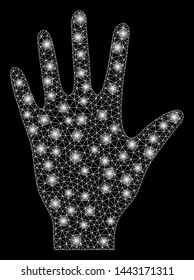 Glowing mesh hand with glare effect. Abstract illuminated model of hand icon. Shiny wire frame polygonal network hand. Vector abstraction on a black background.