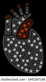 Glowing mesh heart with glitter effect. Abstract illuminated model of heart icon. Shiny wire frame polygonal mesh heart. Vector abstraction on a black background.