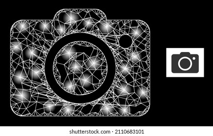 Glowing mesh net photo camera icon with glowing spots. Illuminated constellation generated from photo camera vector icon and crossed lines. Illuminated frame photo camera, on a black background.