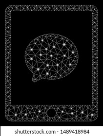 Glowing mesh pad chat message with glow effect. Abstract illuminated model of pad chat message icon. Shiny wire frame polygonal network pad chat message. Vector abstraction on a black background.