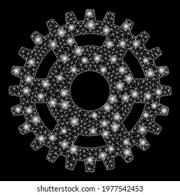 Glowing mesh pinion with sparkle effect. Abstract illuminated model of pinion icon. Shiny wire carcass polygonal mesh pinion. Vector abstraction on a black background.