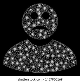Glowing mesh sad man with glitter effect. Abstract illuminated model of sad man icon. Shiny wire frame polygonal mesh sad man. Vector abstraction on a black background.