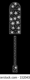 Glowing mesh screwdriver with glare effect. Abstract illuminated model of screwdriver icon. Shiny wire frame polygonal network screwdriver. Vector abstraction on a black background.
