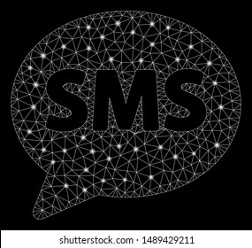 Glowing mesh SMS balloon with lightspot effect. Abstract illuminated model of SMS balloon icon. Shiny wire frame triangular mesh SMS balloon. Vector abstraction on a black background.