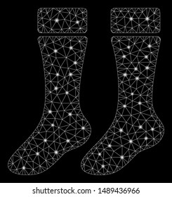 Glowing mesh socks with lightspot effect. Abstract illuminated model of socks icon. Shiny wire carcass polygonal network socks. Vector abstraction on a black background.