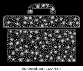 Glowing mesh toolbox with sparkle effect. Abstract illuminated model of toolbox icon. Shiny wire carcass polygonal mesh toolbox. Vector abstraction on a black background.