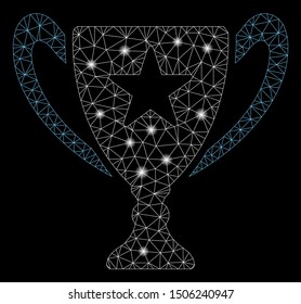 Glowing mesh trophy cup with sparkle effect. Abstract illuminated model of trophy cup icon. Shiny wire frame polygonal mesh trophy cup. Vector abstraction on a black background.