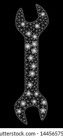 Glowing mesh wrench with glitter effect. Abstract illuminated model of wrench icon. Shiny wire carcass triangular mesh wrench. Vector abstraction on a black background.