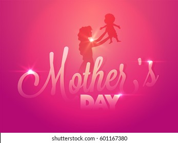 Glowing Mother's Day background with silhouette of woman playing with her little child.