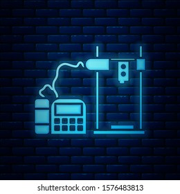 Glowing neon 3D printer icon isolated on brick wall background.  Vector Illustration