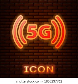 Glowing neon 5G new wireless internet wifi connection icon isolated on brick wall background. Global network high speed connection data rate technology. Vector.