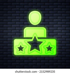 Glowing neon Actor star icon isolated on brick wall background.  Vector