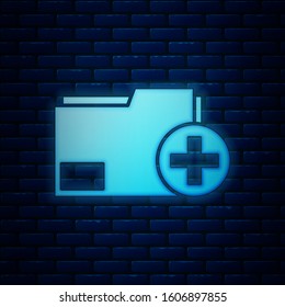 Glowing neon Add new folder icon isolated on brick wall background. New folder file. Copy document icon. Add attach create folder make new plus.  Vector Illustration