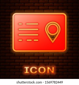 Glowing neon Address book icon isolated on brick wall background. Telephone directory.  Vector Illustration