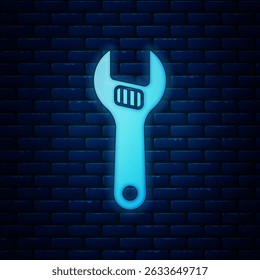 Glowing neon Adjustable wrench icon isolated on brick wall background.  Vector
