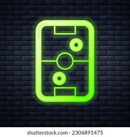 Glowing neon Air hockey table icon isolated on brick wall background.  Vector