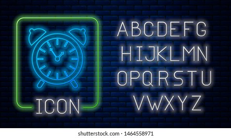 Glowing neon Alarm clock icon isolated on brick wall background. Wake up, get up concept. Time sign. Neon light alphabet. Vector Illustration