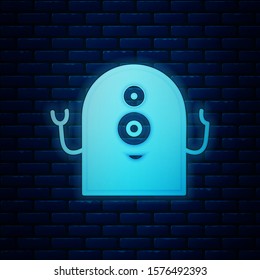 Glowing neon Alien icon isolated on brick wall background. Extraterrestrial alien face or head symbol.  Vector Illustration