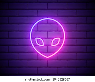 Glowing neon Alien icon isolated on brick wall background. Extraterrestrial alien face or head symbol. Vector Illustration.