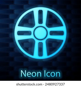 Glowing neon Alloy wheel for a car icon isolated on brick wall background.  Vector