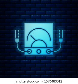 Glowing neon Ampere meter, multimeter, voltmeter icon isolated on brick wall background. Instruments for measurement of electric current.  Vector Illustration