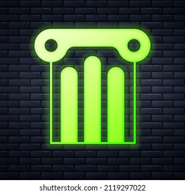 Glowing neon Ancient column icon isolated on brick wall background.  Vector