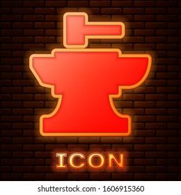 Glowing neon Anvil for blacksmithing and hammer icon isolated on brick wall background. Metal forging. Forge tool.  Vector Illustration