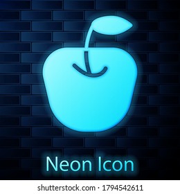 Glowing neon Apple icon isolated on brick wall background. Fruit with leaf symbol. Vector