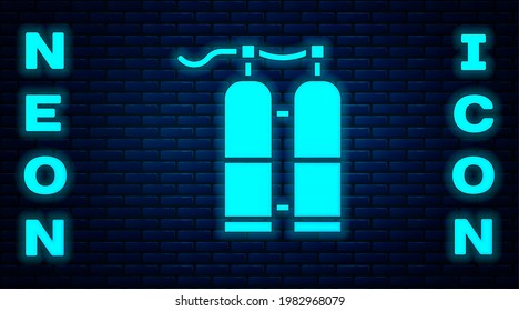 Glowing neon Aqualung icon isolated on brick wall background. Oxygen tank for diver. Diving equipment. Extreme sport. Sport equipment.  Vector Illustration