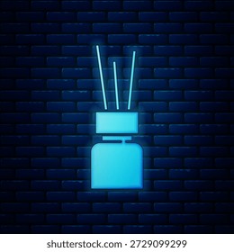 Glowing neon Aroma diffuser icon isolated on brick wall background. Glass jar different with wooden aroma sticks.  Vector