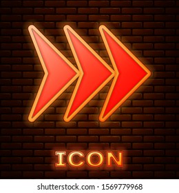 Glowing neon Arrow icon isolated on brick wall background. Direction Arrowhead symbol. Navigation pointer sign.  Vector Illustration