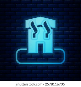 Glowing neon Arson home icon isolated on brick wall background. Fire in building. Flames from office windows. Burn facility. Spontaneous disaster.  Vector