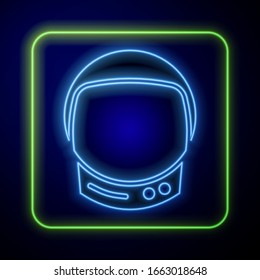 Glowing neon Astronaut helmet icon isolated on blue background.  Vector Illustration