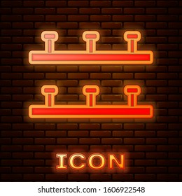 Glowing neon Automatic irrigation sprinklers icon isolated on brick wall background. Watering equipment. Garden element. Spray gun icon.  Vector Illustration