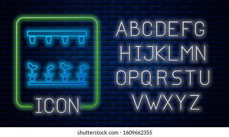 Glowing neon Automatic irrigation sprinklers icon isolated on brick wall background. Watering equipment. Garden element. Spray gun icon. Neon light alphabet. Vector Illustration