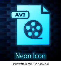 Glowing neon AVI file document. Download avi button icon isolated on brick wall background. AVI file symbol.  Vector Illustration