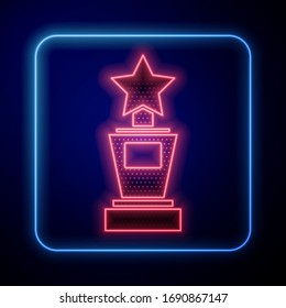 Glowing neon Award cup icon isolated on blue background. Winner trophy symbol. Championship or competition trophy. Sports achievement sign.  Vector Illustration