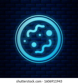 Glowing neon Bacteria icon isolated on brick wall background. Bacteria and germs, microorganism disease causing, cell cancer, microbe, virus, fungi.  Vector Illustration