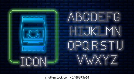 Glowing neon Bag of food for cat icon isolated on brick wall background. Food for animals. Pet food package. Neon light alphabet. Vector Illustration