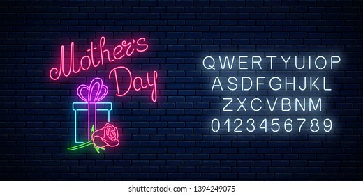 Glowing neon banner of mothers holiday with alphabet on dark brick wall background. Spring world mothers day greeting card with gift box and rose flower. Vector illustration.