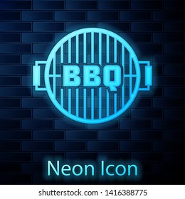 Glowing neon Barbecue grill icon isolated on brick wall background. Top view of BBQ grill. Steel grid. Vector Illustration