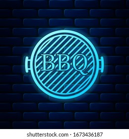 Glowing neon Barbecue grill icon isolated on brick wall background. Top view of BBQ grill.  Vector Illustration